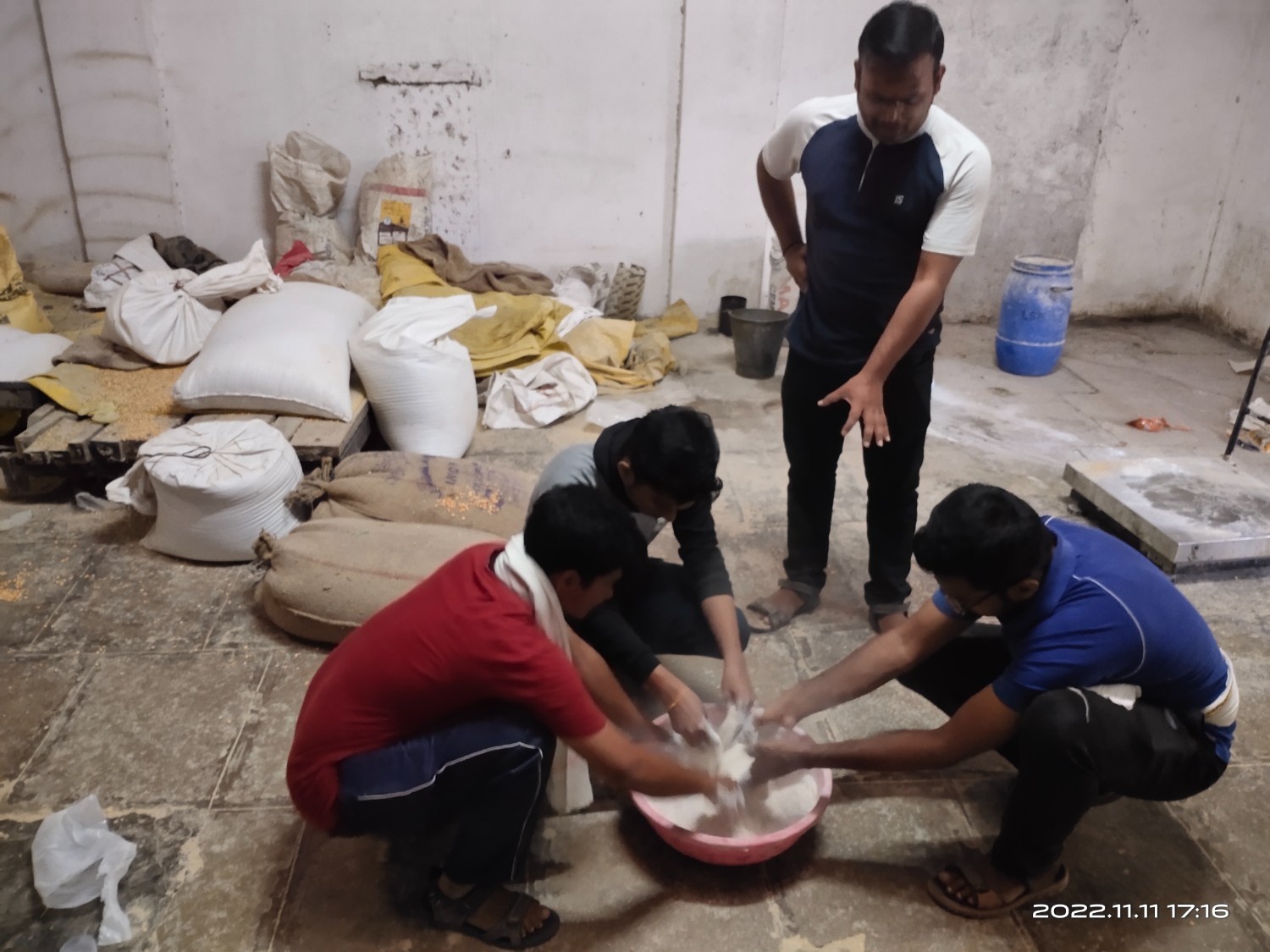 Students Preparing Concentrate Mixture During ETP On Goat Farming